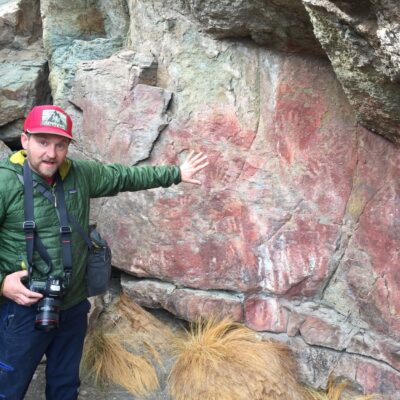 Archaeological overhang with rock paintings of hands - Patagonia National Park Chile.